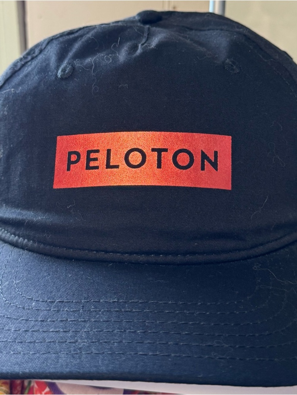 Peloton Black Hat with Red Logo Rectangle. Work out.  Jog.  Bike